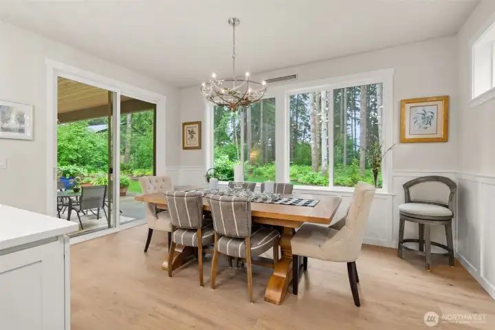 Dining Room with charming chandelier and access to spacious covered patio Dining Room with charming chandelier and access to spacious covered patio