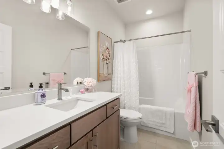 Main Floor Full Bath with Quartz Counter Main Floor Full Bath with Quartz Counter