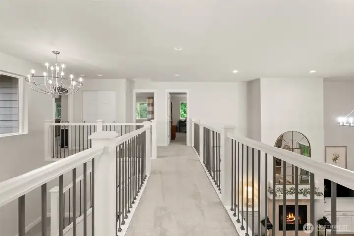 Elegant interior balcony, 2 of the 3 bedrooms upstairs ahead + rec room to the left Elegant interior balcony, 2 of the 3 bedrooms upstairs ahead + rec room to the left