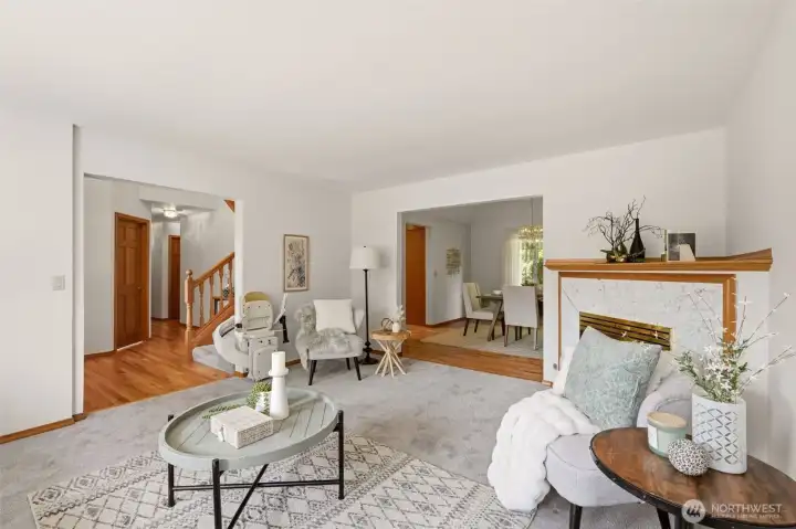 This formal living room flows seamlessly to a formal dining room. This formal living room flows seamlessly to a formal dining room.