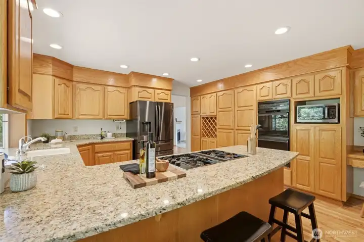 Enter the kitchen to find ample storage and counter space to satisfy even the most ambitious chef! Enter the kitchen to find ample storage and counter space to satisfy even the most ambitious chef!