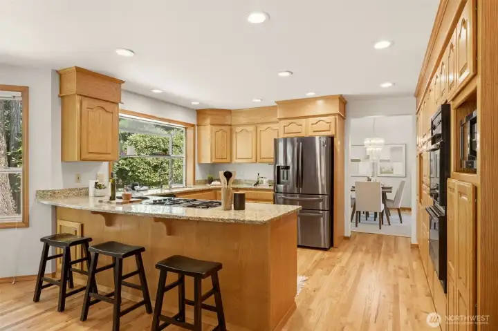 Grab a quick meal or visit with the cook of the house at the breakfast counter. Grab a quick meal or visit with the cook of the house at the breakfast counter.