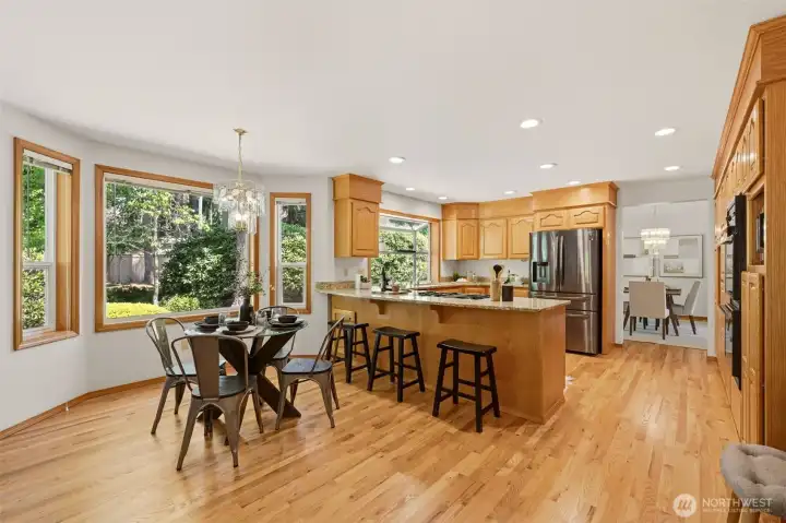 A cheerful dining nook area is located just off the the kitchen. A cheerful dining nook area is located just off the the kitchen.