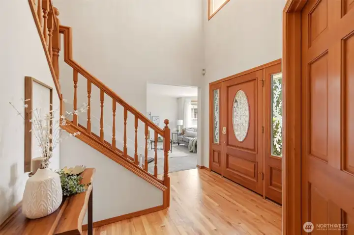 This grand entry accesses several areas of the home. The stairway is equipped with a motorized chair lift. This grand entry accesses several areas of the home. The stairway is equipped with a motorized chair lift.