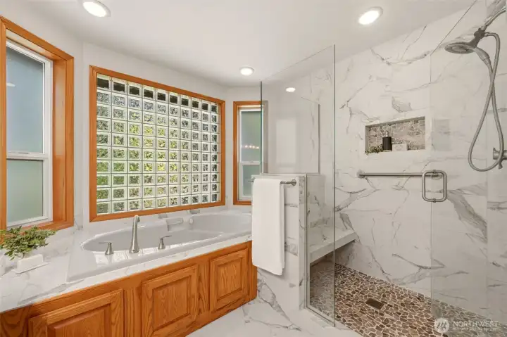 This bathroom has been updated with beautiful marble floors and tile! This bathroom has been updated with beautiful marble floors and tile!