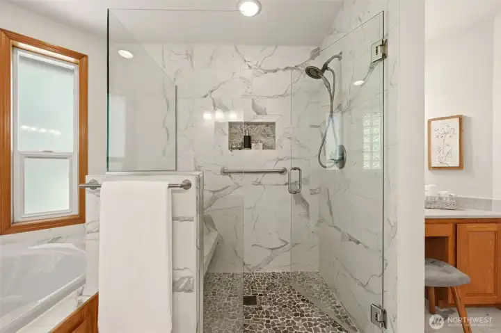 Another bathroom view showing the gorgeous shower and vanity table. Another bathroom view showing the gorgeous shower and vanity table.