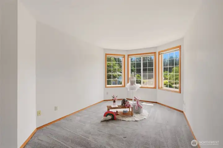 The fourth upstairs bedroom has charming bay windows! The fourth upstairs bedroom has charming bay windows!