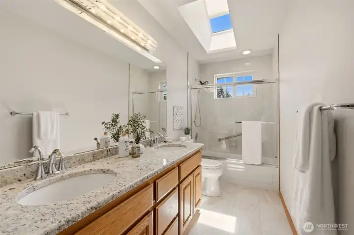 This upstairs hall bath has lots of space and a cheerful skylight! This upstairs hall bath has lots of space and a cheerful skylight!