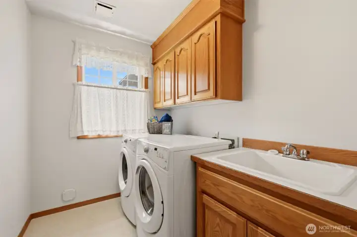 Downstairs, just off the garage, is the laundry room. Downstairs, just off the garage, is the laundry room.