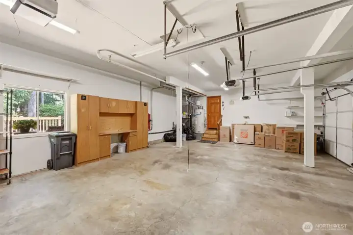 Look at all the parking and storage in this oversized 3-car garage! Look at all the parking and storage in this oversized 3-car garage!