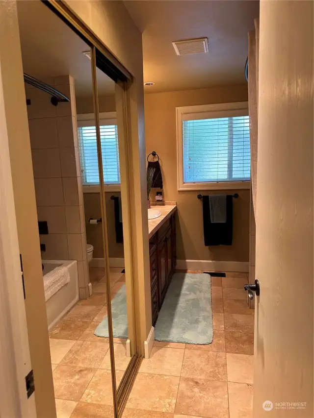 Full bathroom with lots of storage and all custom finishes