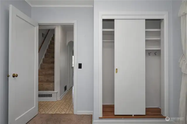 The additional bedroom's closet offers several storage options.