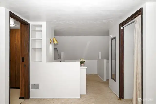 This half of the upstairs space features a 3/4 bathroom, a closet and an oversized open concept bedroom. The sellers used this bedroom as their primary bedroom.