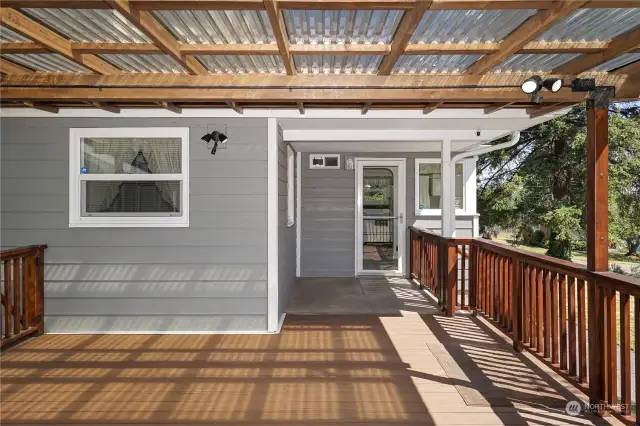 Enjoy this 2021 built, covered deck year round!