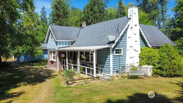 Covered front porch has Ramp or take it out & uncover the beautiful brick steps