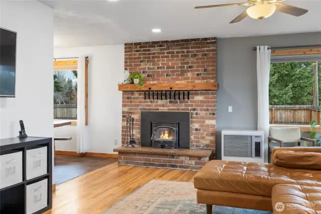 This home has an oil heater in addition to the beautiful wood fireplace & electric wall heat.