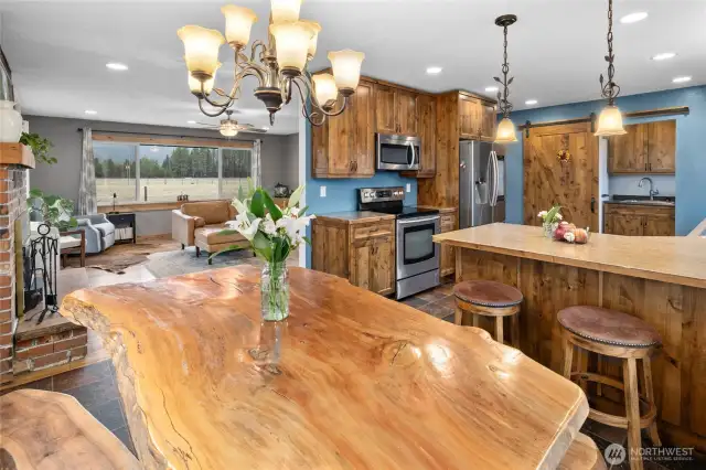Looking from the dining room towards the kitchen & living space.