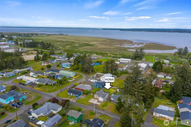 Two bedroom home with one and a 3/4 bath near the beach! Under 400,000.00! New Roof too!