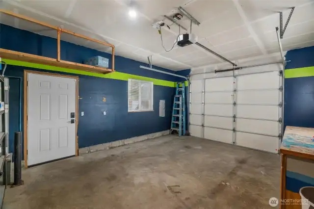 One car garage with built in loft area for storage.