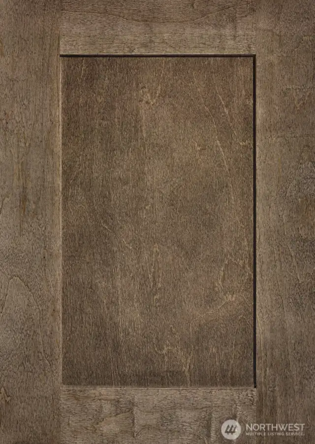Shaker style Cocoa-stained Maple cabinets throughout.
