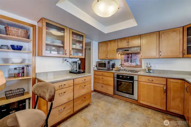 Custom cabinetry, soft-close drawers, quartz, gas range, Bosch appliances, open plan...what more could you want?