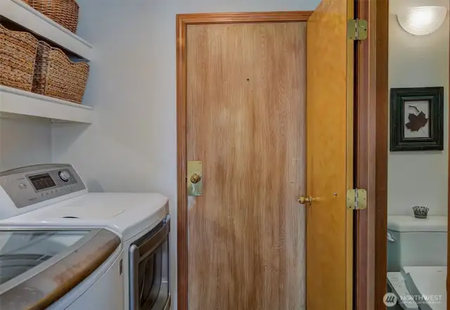 Utility room has a powder room next to it with a bidet!