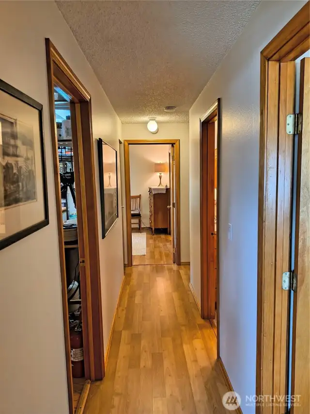 Warm laminate floors run throughout home