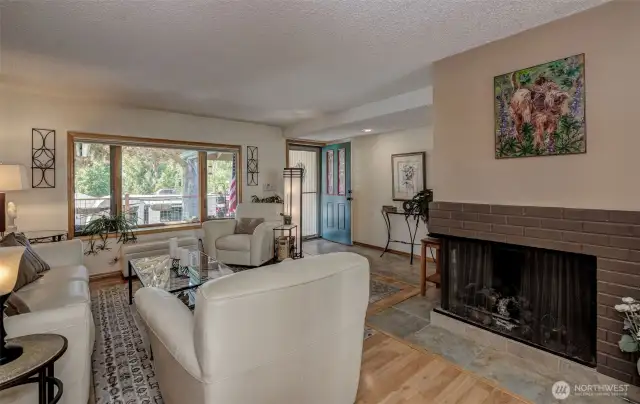 Living room fireplace is corner-shaped