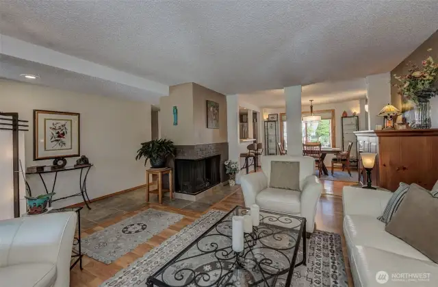 Living room flows into dining room, kitchen and hallway to bedrooms