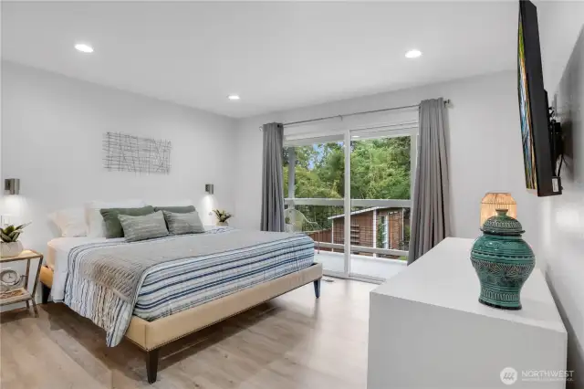 Walk out to the covered deck from primary bedroom