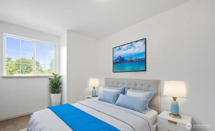 Primary bedroom with vaulted ceiling - virtually staged.