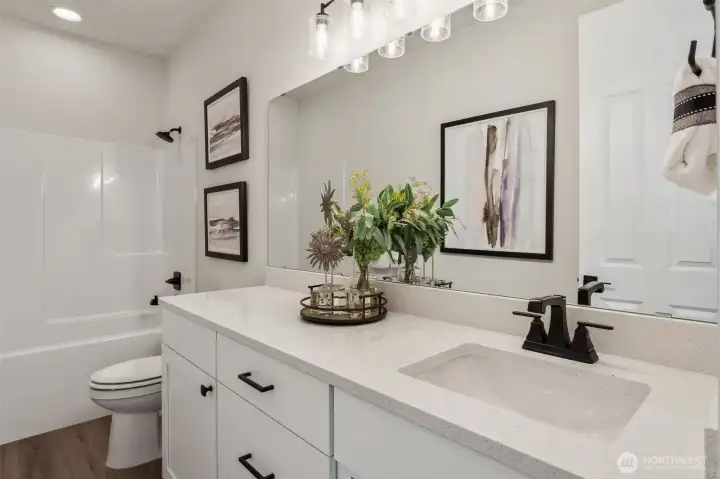 Photos are of the model home. Colors & finishes may vary.