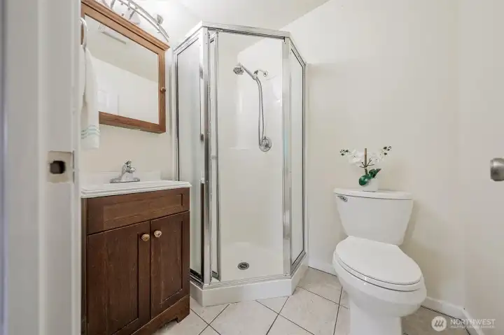 The primary bath has easy access from the primary bedroom.