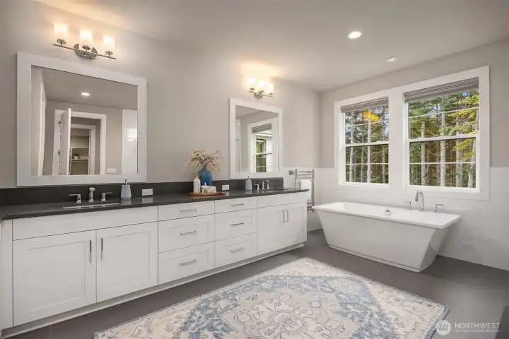 A true spa-inspired primary bath with double sinks and plenty of counter and cabinet space
