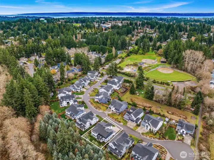 Location of 8722 Winslow Grove shows the open space adjacent to the backyard