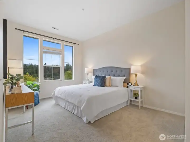 Primary suite- staged with a king sized bed.