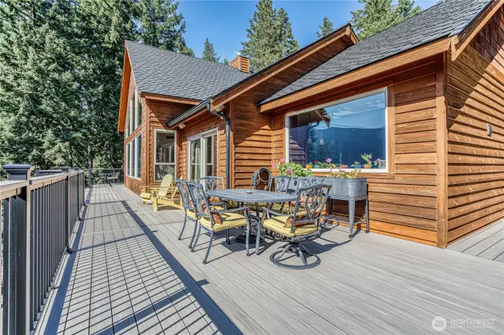 Large wrap-around deck with custom lighting and drink rail is a great place to enjoy the views & unwind.