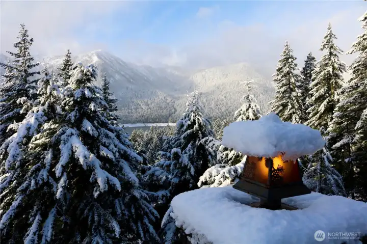 Snow is beautiful in winter & the snowmobiling is top notch. Garage has doors at both ends that allow drive-through snowmobile access directly to local trails.