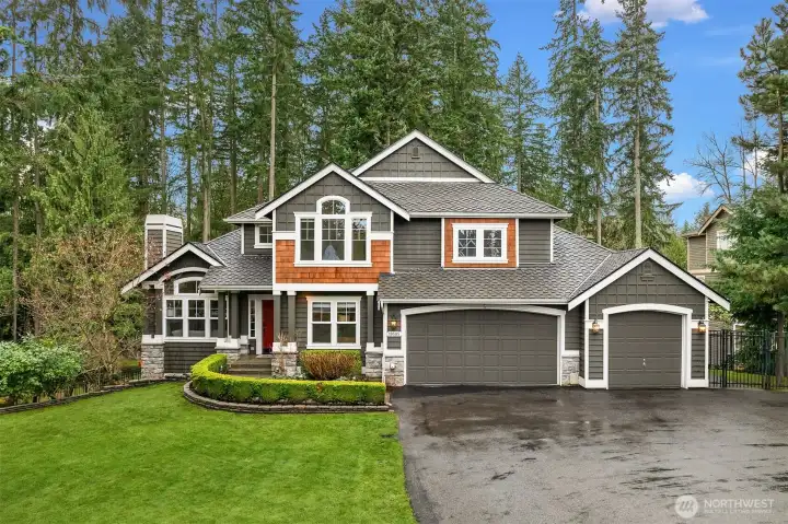 Welcome to the sought-after Leota community in Woodinville, where comfort, convenience, and Northwest charm come together in this beautiful home all set on a generous half-acre+ lot.