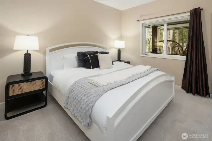 Lower level private guest bedroom.