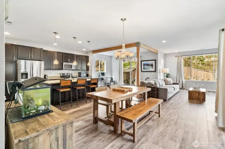 Spacious open-concept living area connecting kitchen, dining, and living room—ideal for everyday living and entertaining.