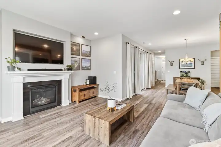 Expansive open-concept layout connecting living, dining, and kitchen areas.