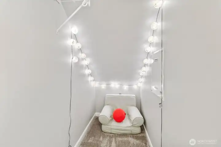 Versatile under-stair storage or reading nook.