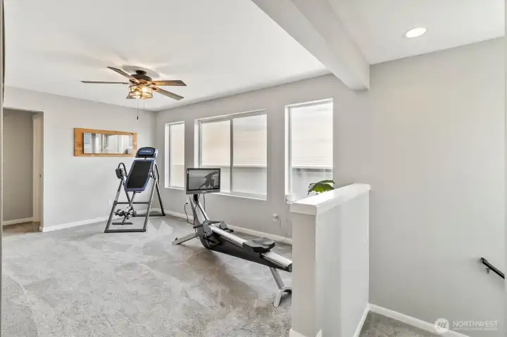 Flexible loft/bonus space ideal for home office, playroom, or media area.