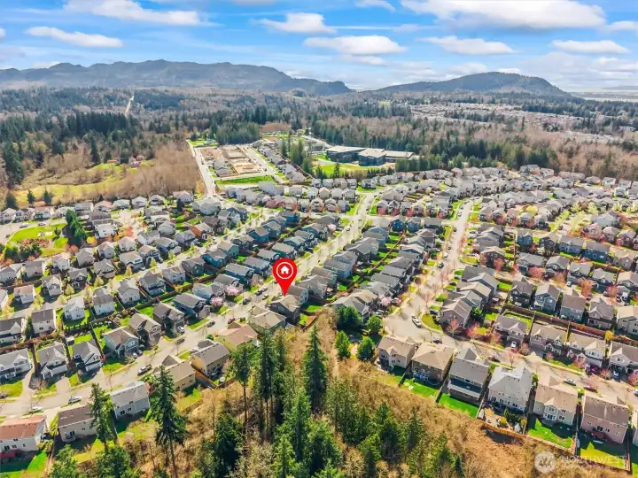 Elevated aerial showcasing proximity to open space and scenic surroundings.