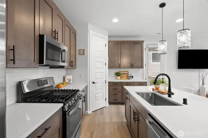 Kitchen with all stainless appliances