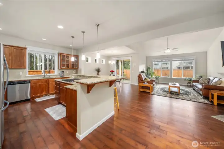 Open-concept layout seamlessly connects the kitchen, dining, and living areas—ideal for modern living and effortless entertaining.