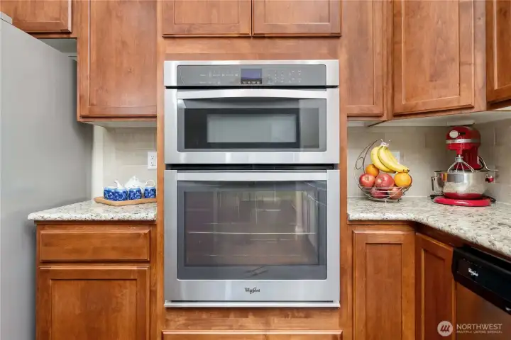 Built-in oven and microwave offer convenience and a streamlined look, perfectly integrated into the cabinetry.