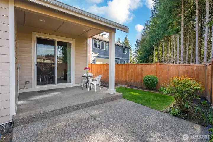 Backyard features both covered and uncovered patio areas—perfect for year-round enjoyment, from shaded lounging to soaking up the sun.
