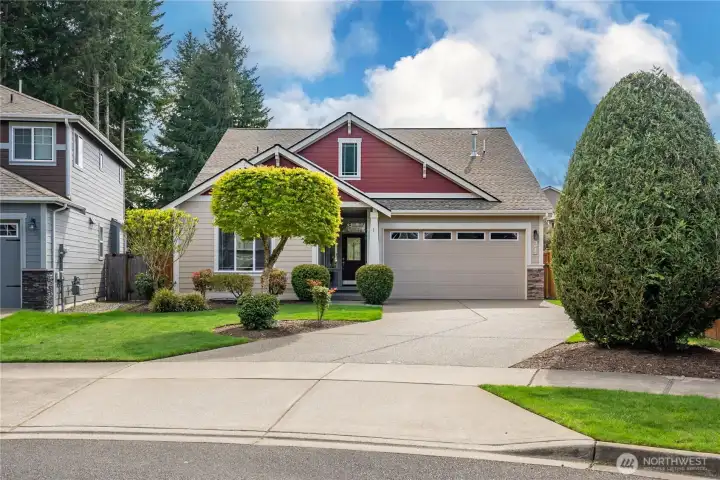 Extended driveway offers plenty of parking—making it easy to host, come and go with ease, and enjoy everyday living.